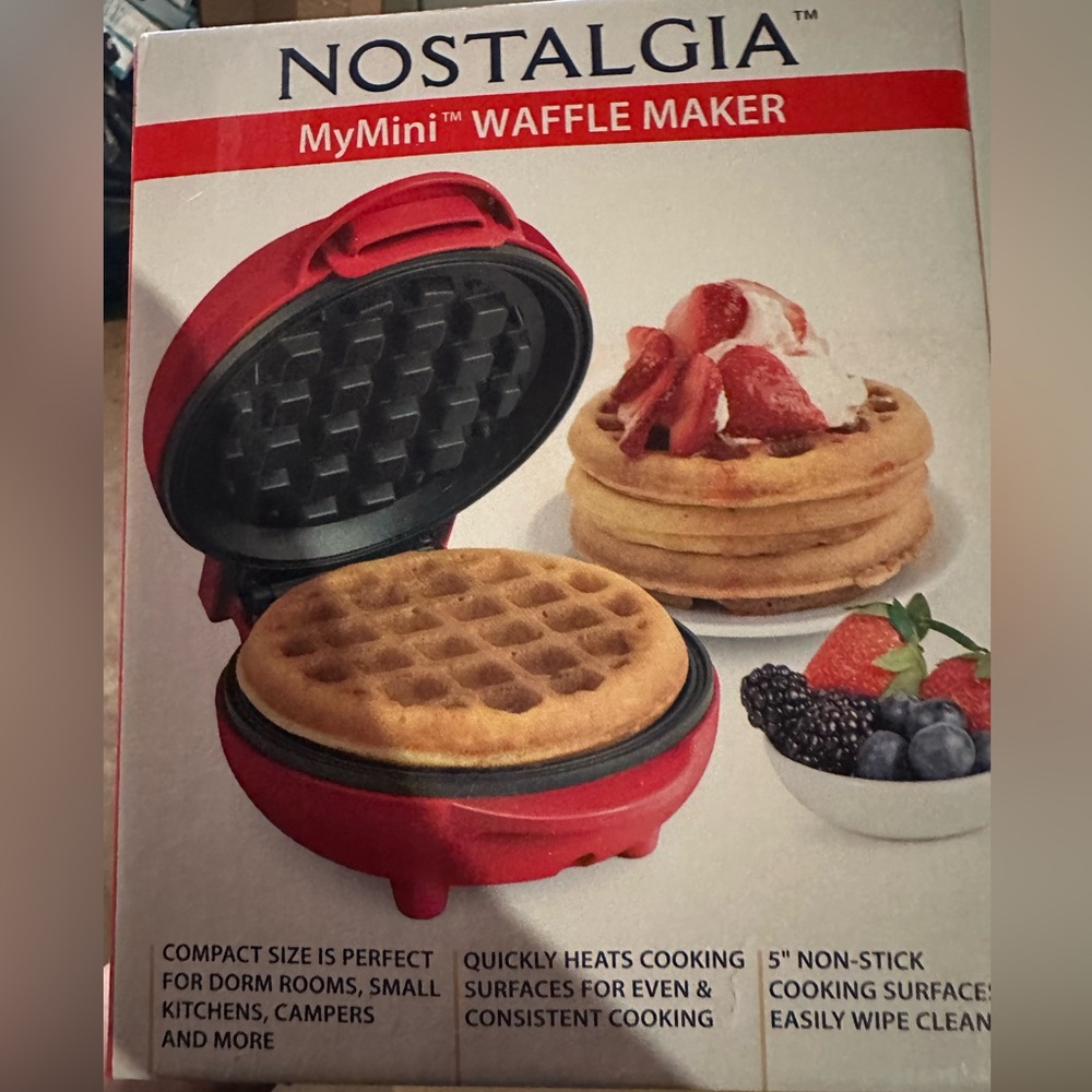 Brand new mini waffle maker. Perfect for a dorm or small home or just whatever.